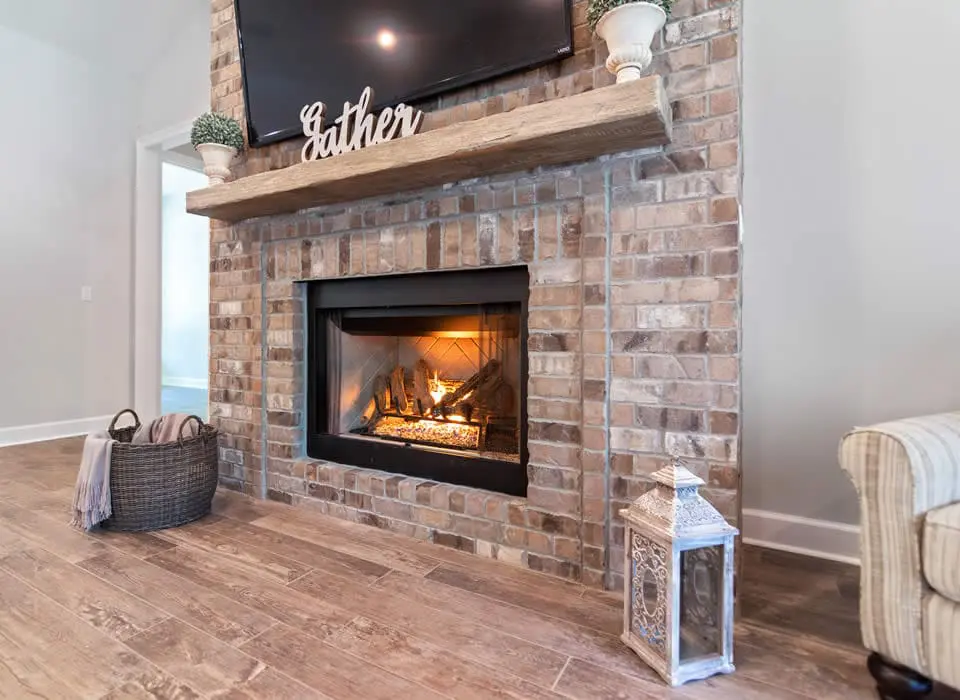Energy-efficient direct-vent gas fireplace installation in a residential living room, providing supplemental heat and ambiance.
