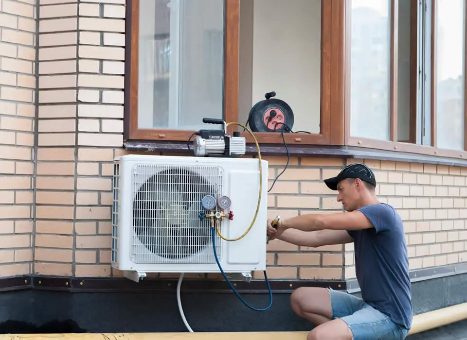Professional ductless heat pump troubleshooting service identifying sensor issues and refrigerant leaks in a residential mini-split system.
