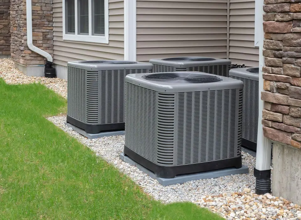 Installation of a high-efficiency electric heat pump system to replace a traditional AC, providing eco-friendly heating and cooling.